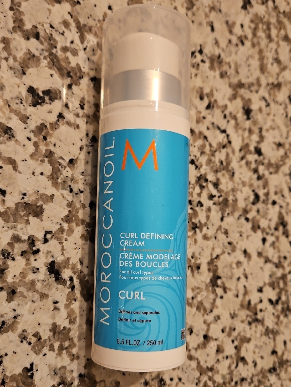 New never used. 8.5 oz. Moroccanoil Curl Defining Cream -